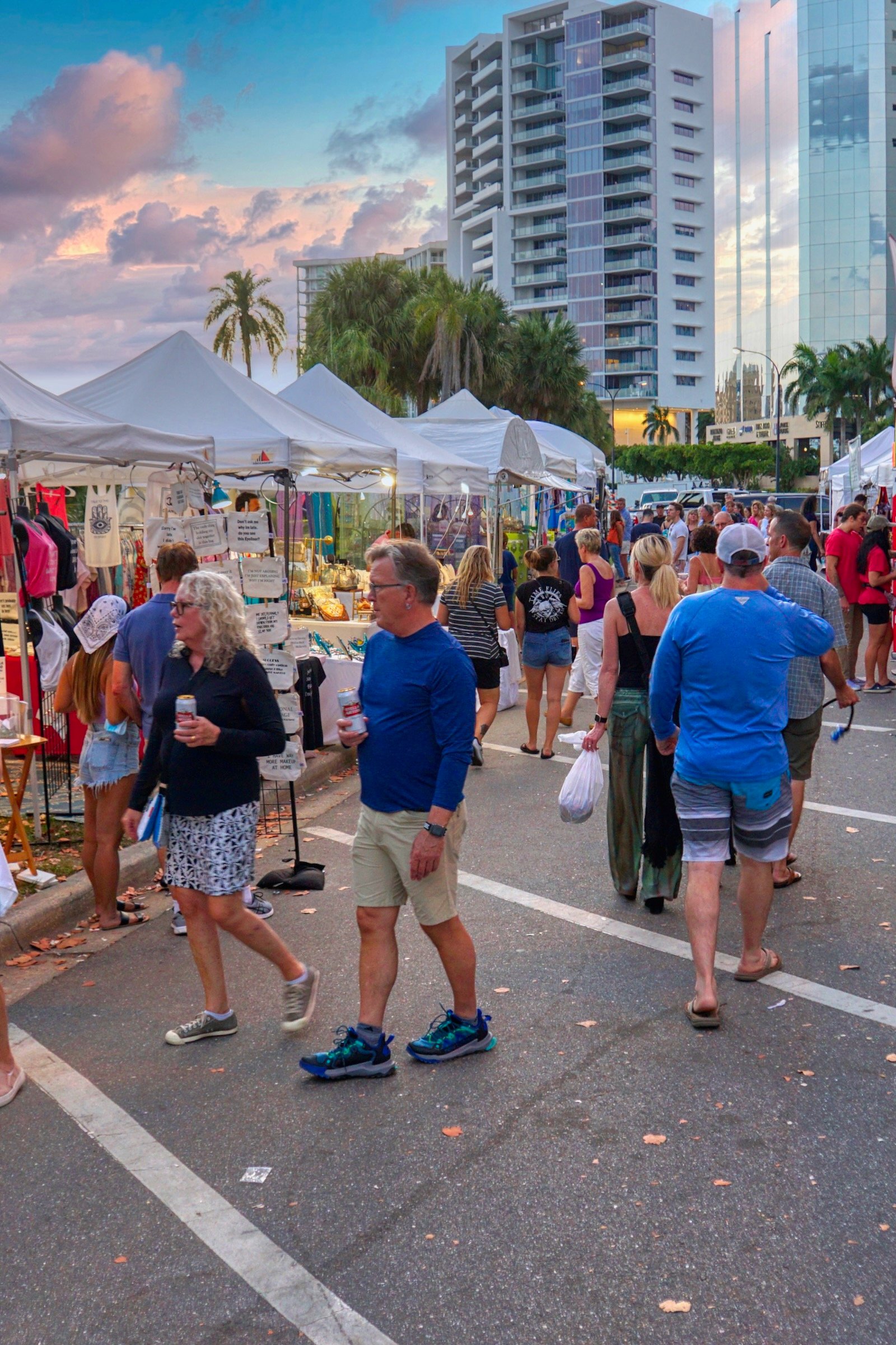 strolling among the food, arts & craft booths at the sarasota seafood & music festival