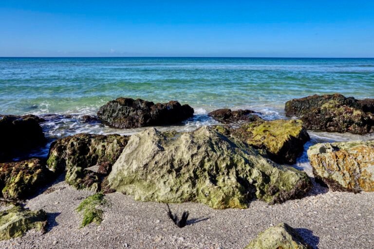 Boulders dot the shoreline at Caspersen Beach Venice FL