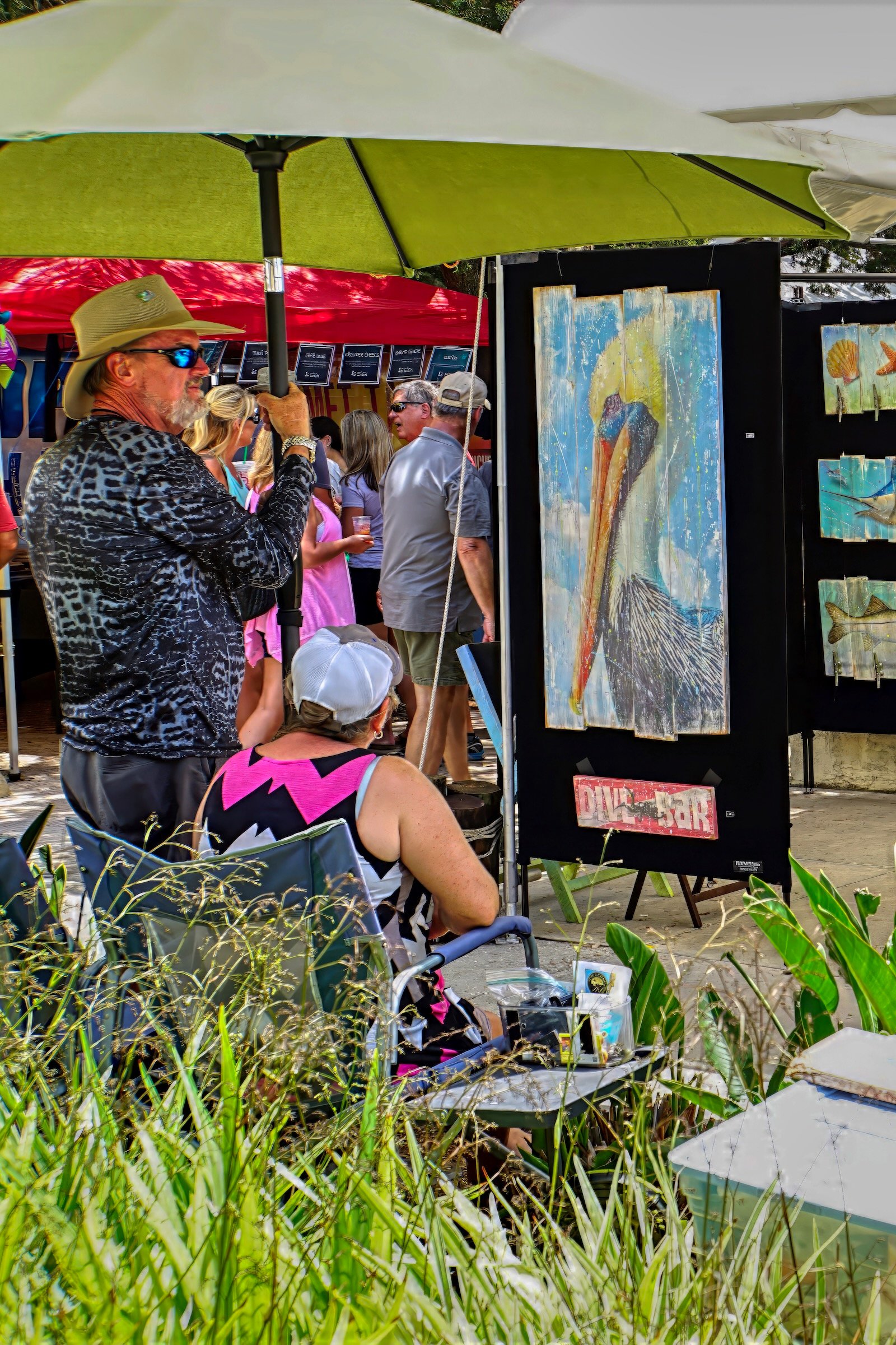 Florida-themed art complements the Sarasota Seafood & Music Festival