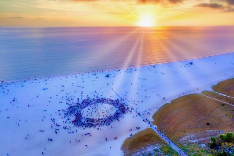 Siesta Key Drum Circle at sunset on Sarasota beach with drummers and dancers