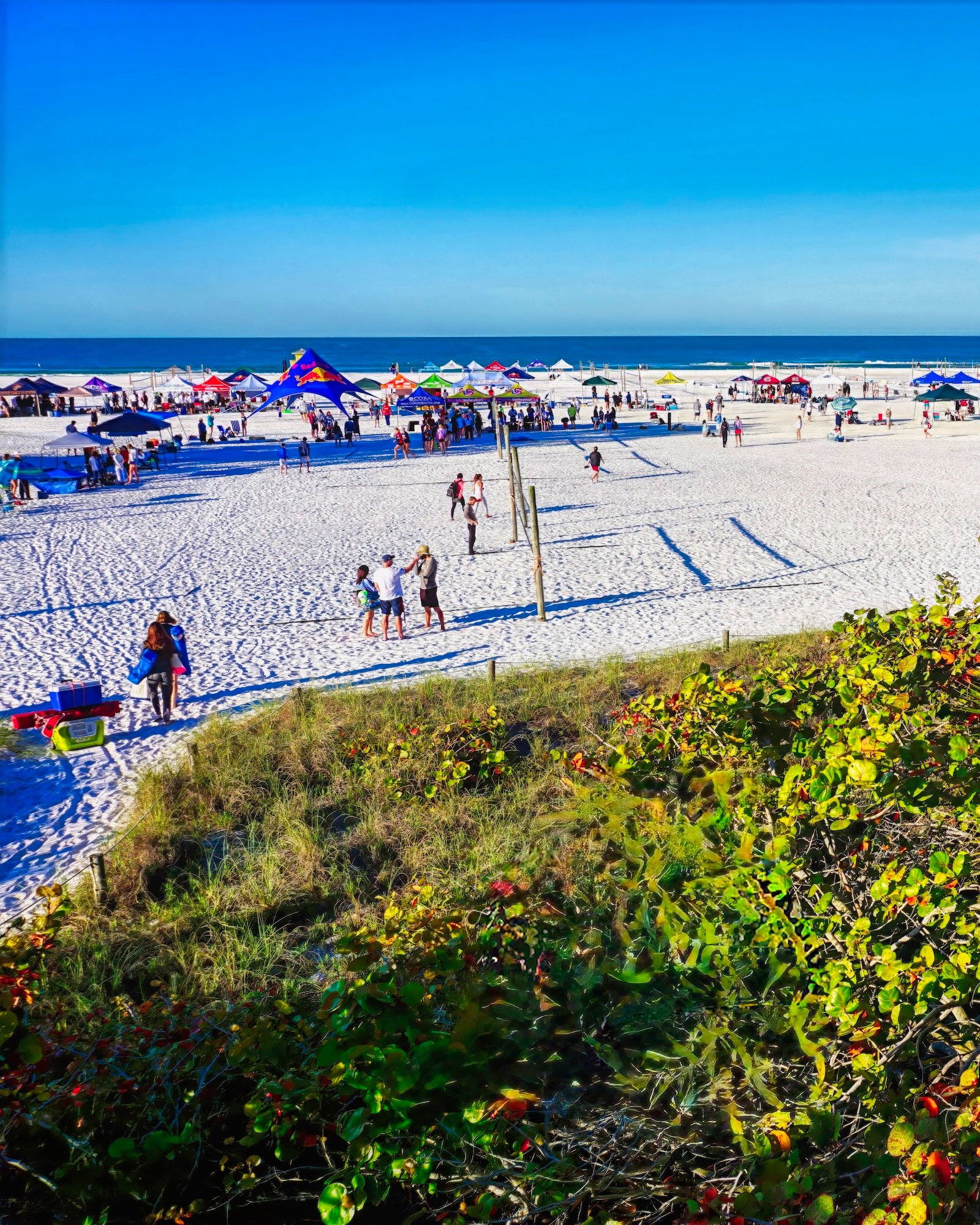 college volleyball players from around the Southeast US descend on Siesta Key Beach