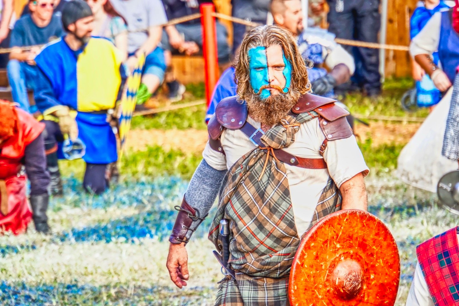 Fans crowd the stadium to enjoy the human chess match at the Sarasota Medieval Fair