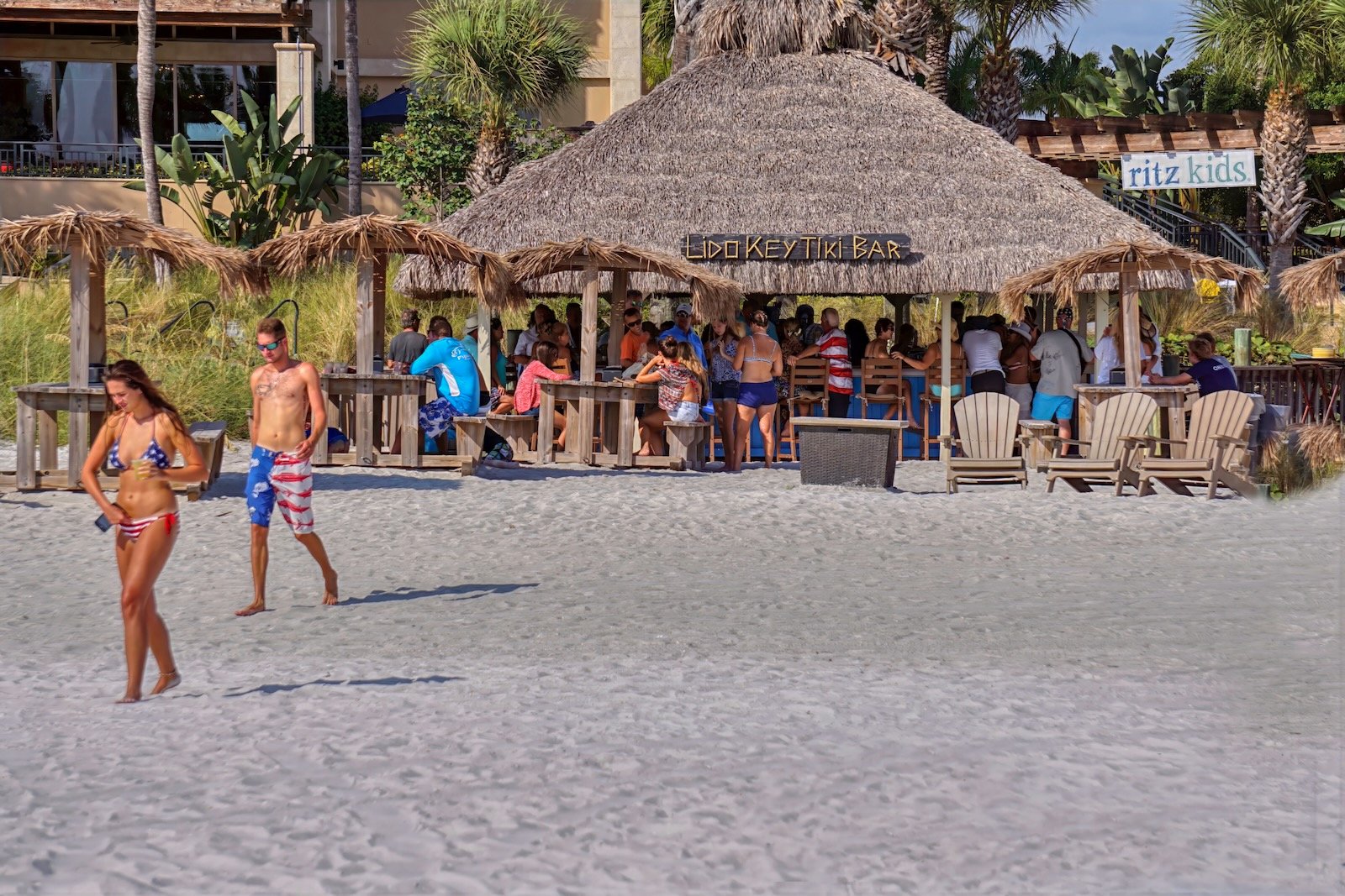 The iconic, off-the-beaten path Lido Key Tiki Bar serves ice cold tropical drinks on race day at the Grand Prix Powerboat Festival in Sarasota, Florida