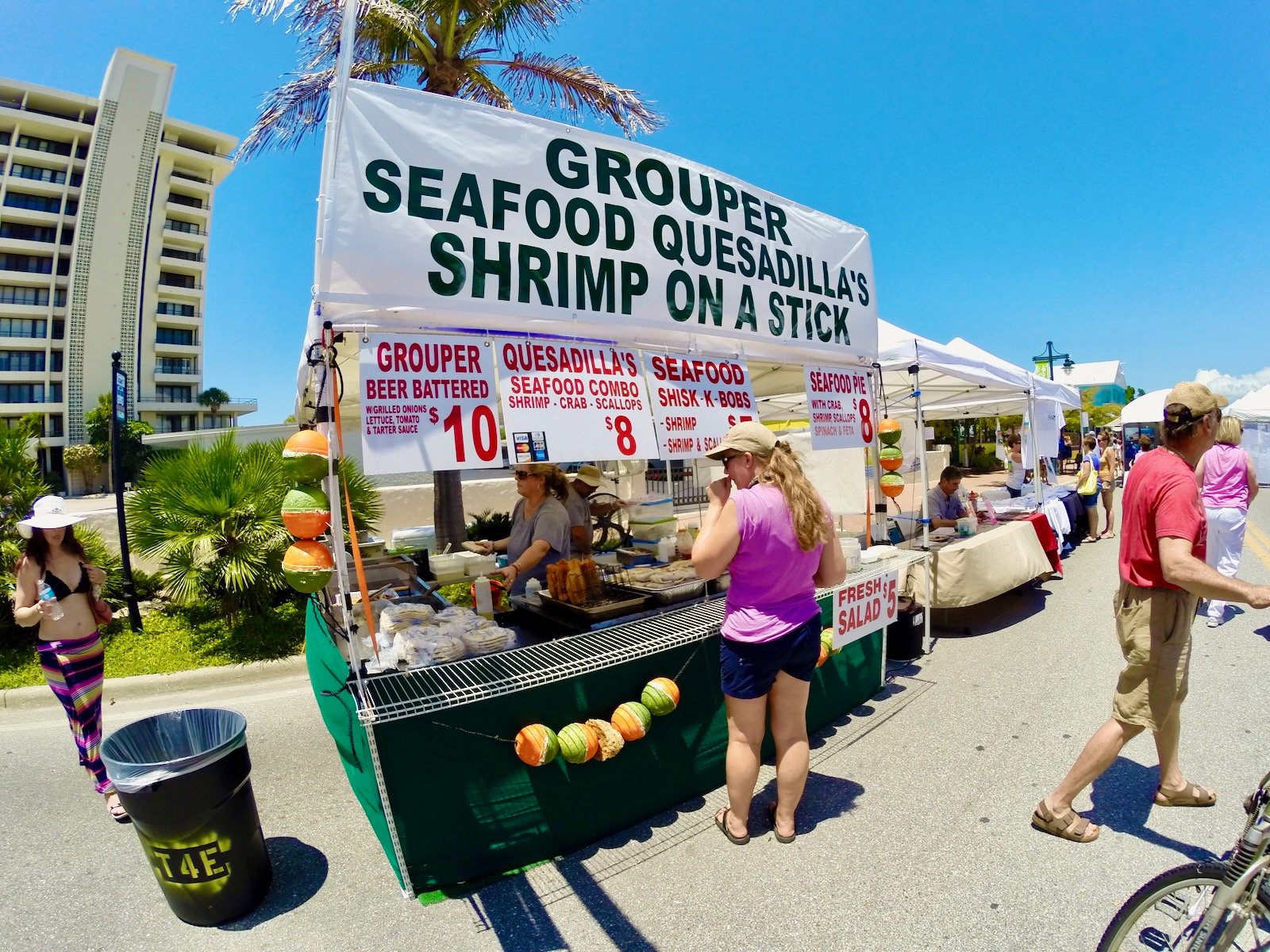 Art, food & drinks line Ocean Boulevard in Siesta Village at the Siesta Fiesta Art Festival
