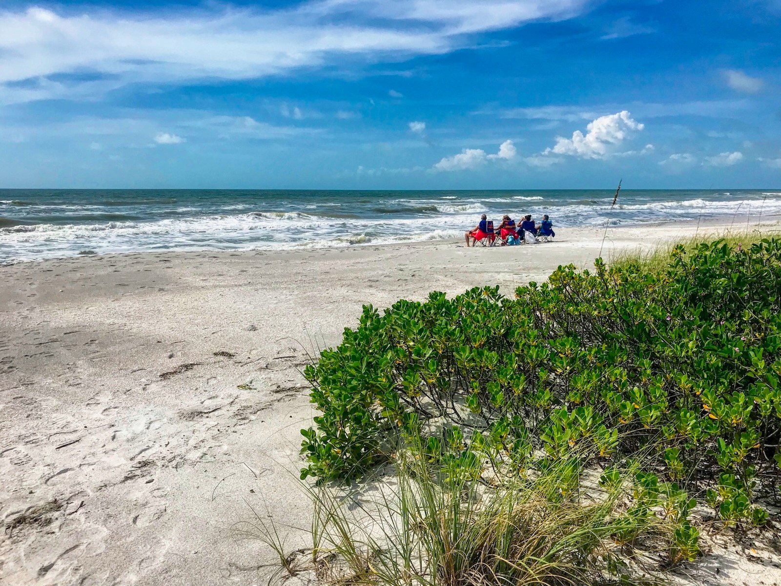 Gulf at Fort Myers Beach slowly recovers from Lake "O" discharges, causing water to turn green.