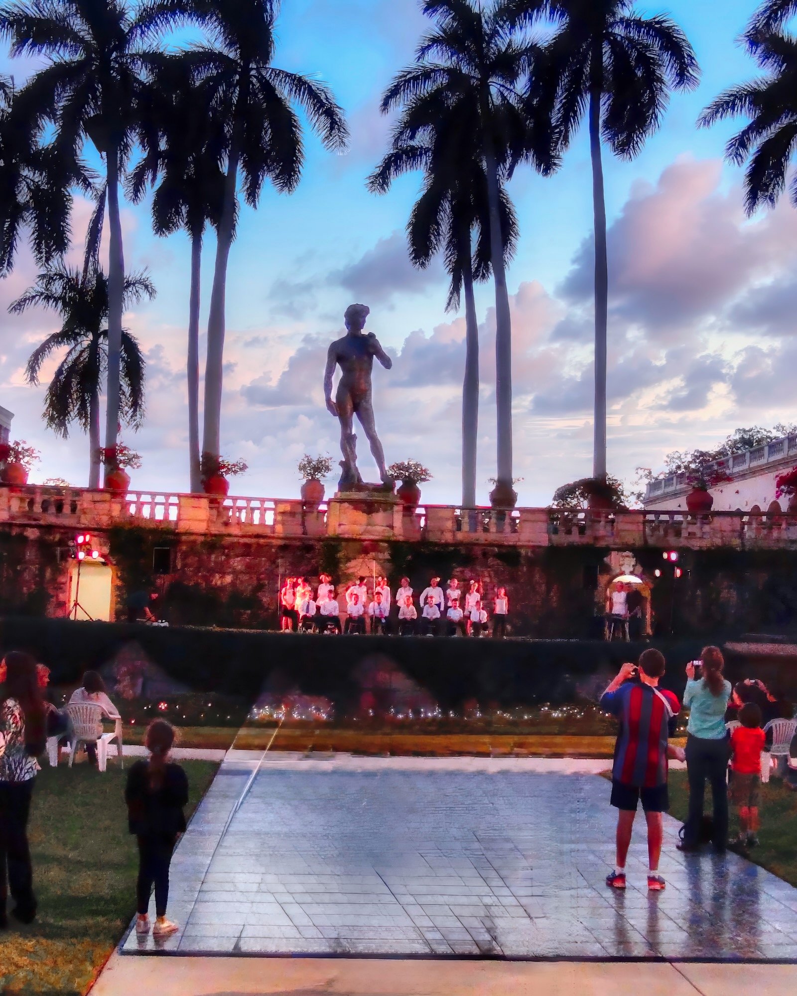 Under the watchful eye of David, local school children perform Christmas songs at The Ringling