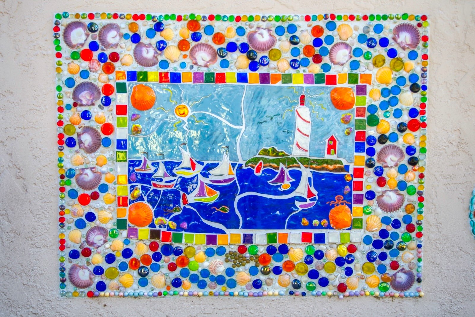 Shell & bead art mosaic on outside wall at Marietta Museum of Art & Whimsy Sarasota