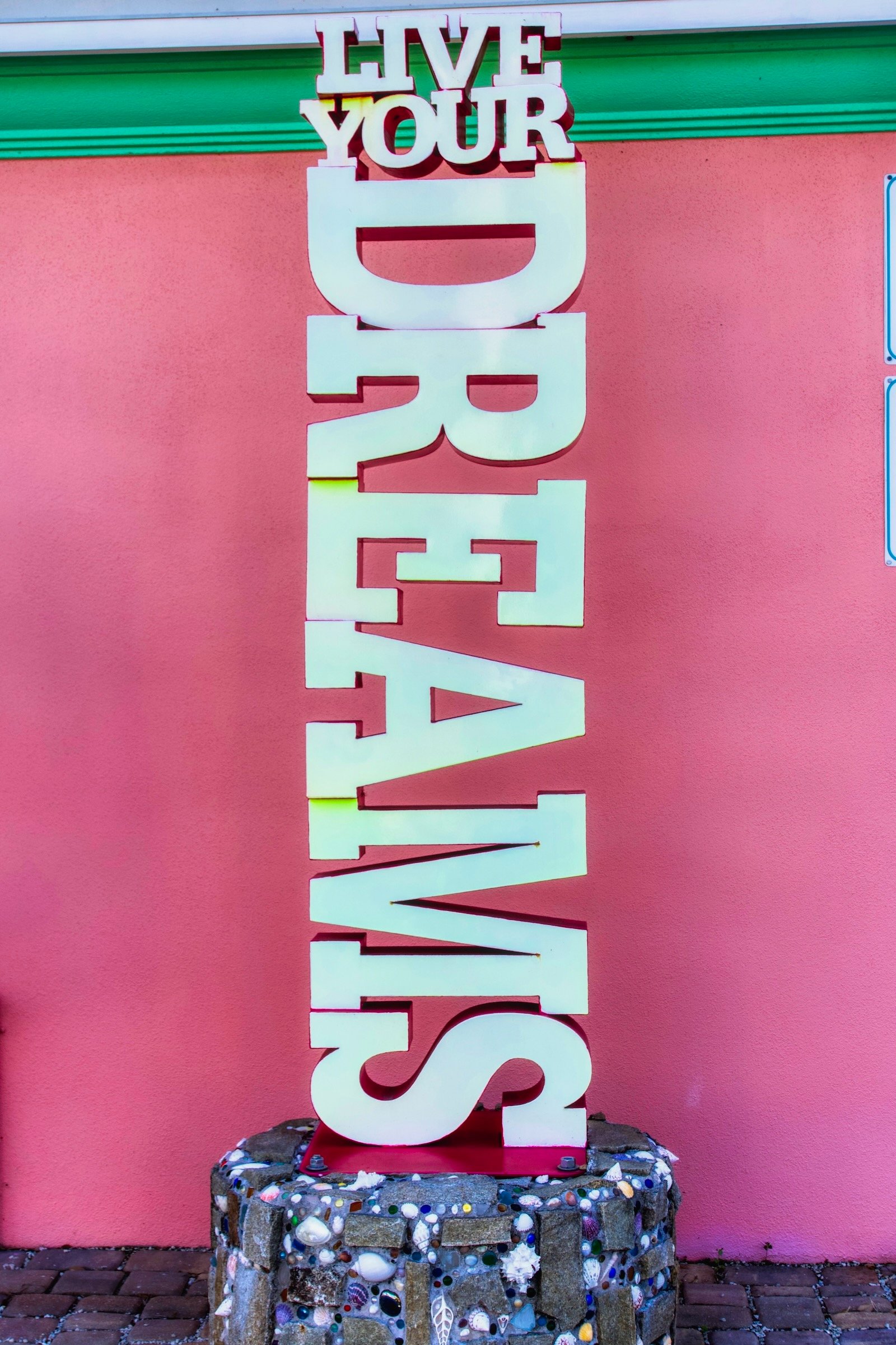 Live Your Dreams message in statue at Marietta Museum of Art & Whimsy Sarasota