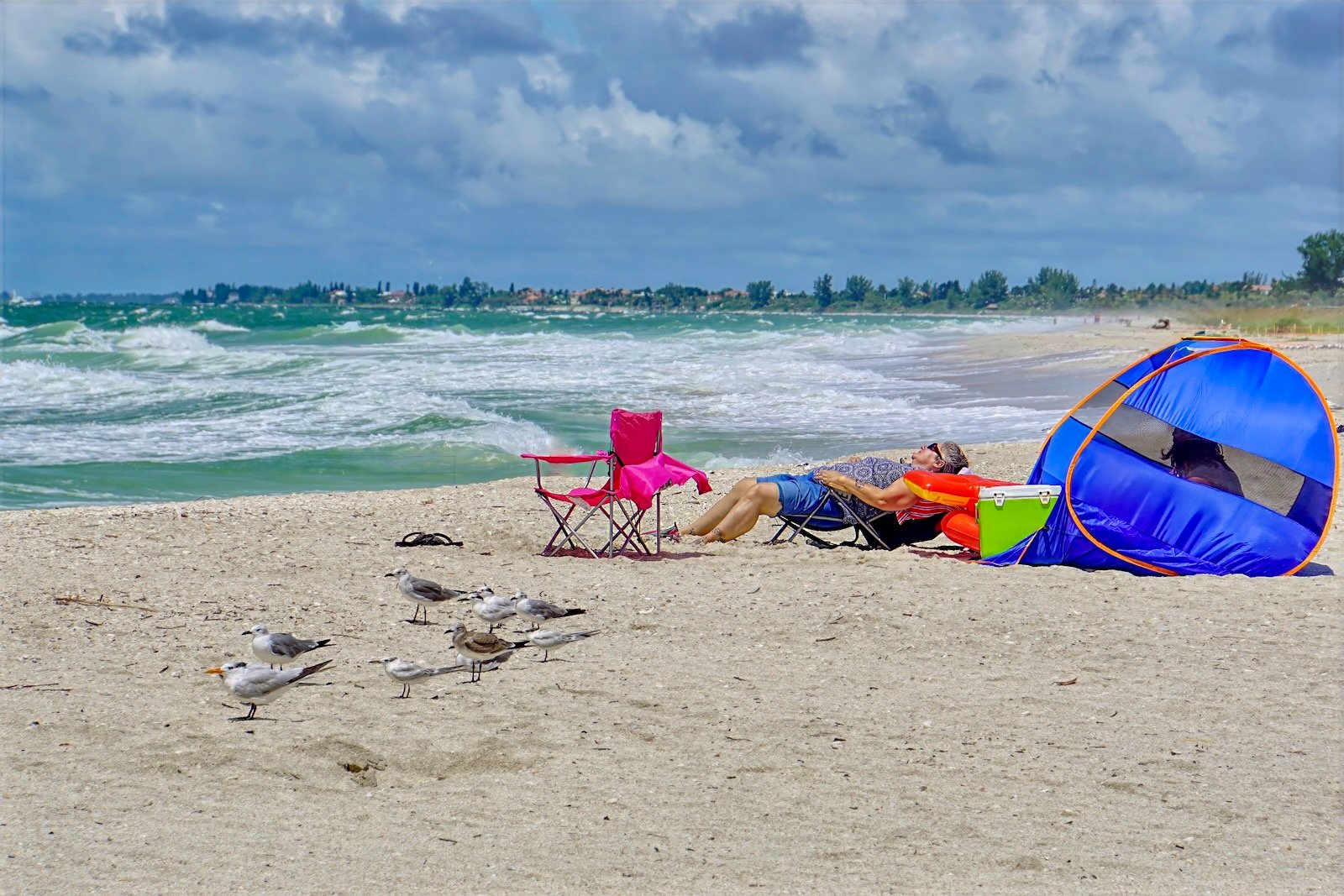person relaxing on Nokomis Beach Florida