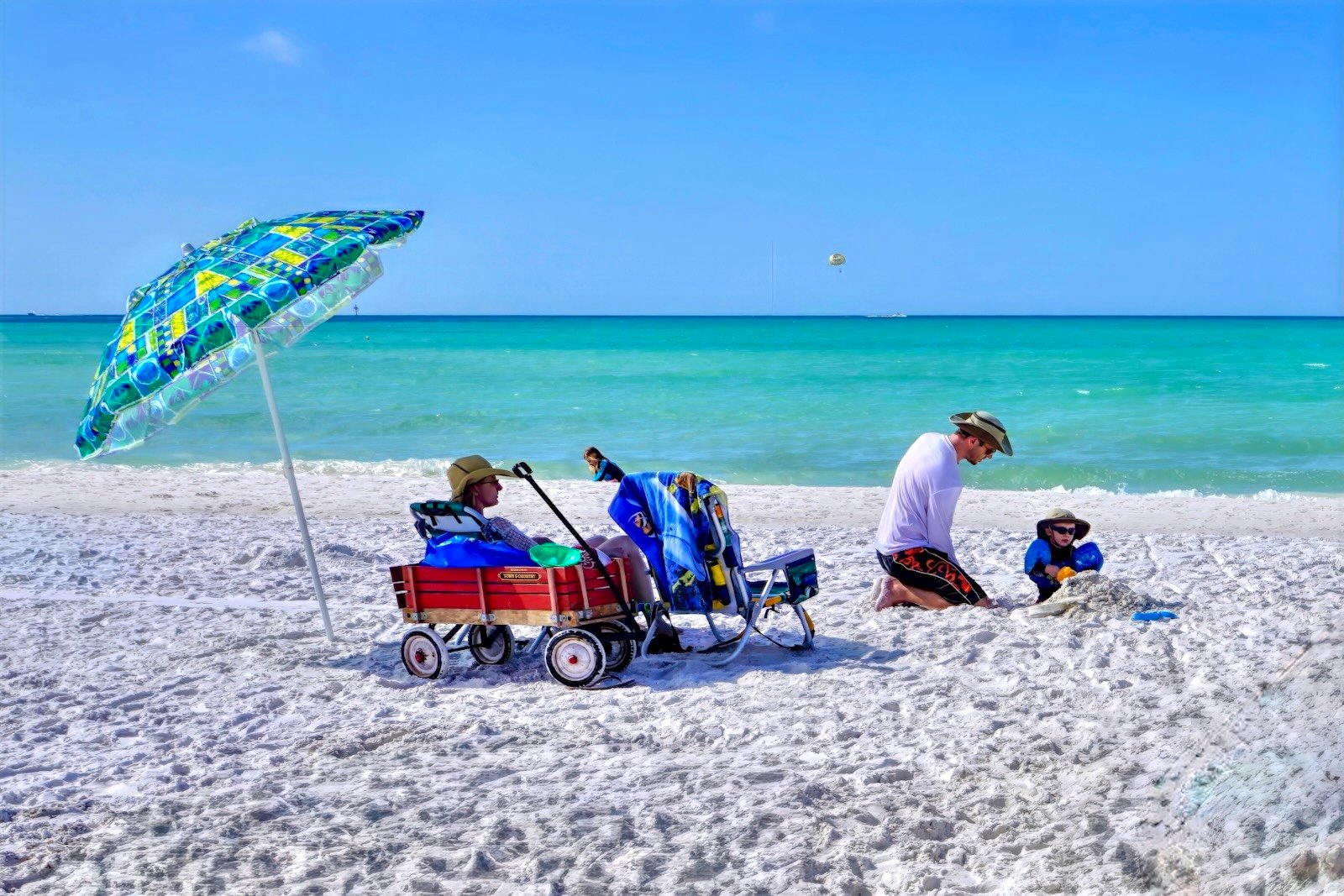 Siesta Key Beach for Families - building a sandcastle at the water's edge