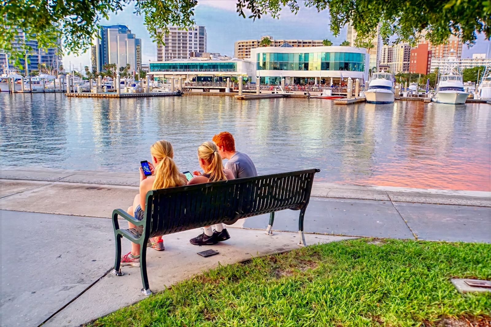family enjoying a bay breeze at the Bayfront Park Sarasota