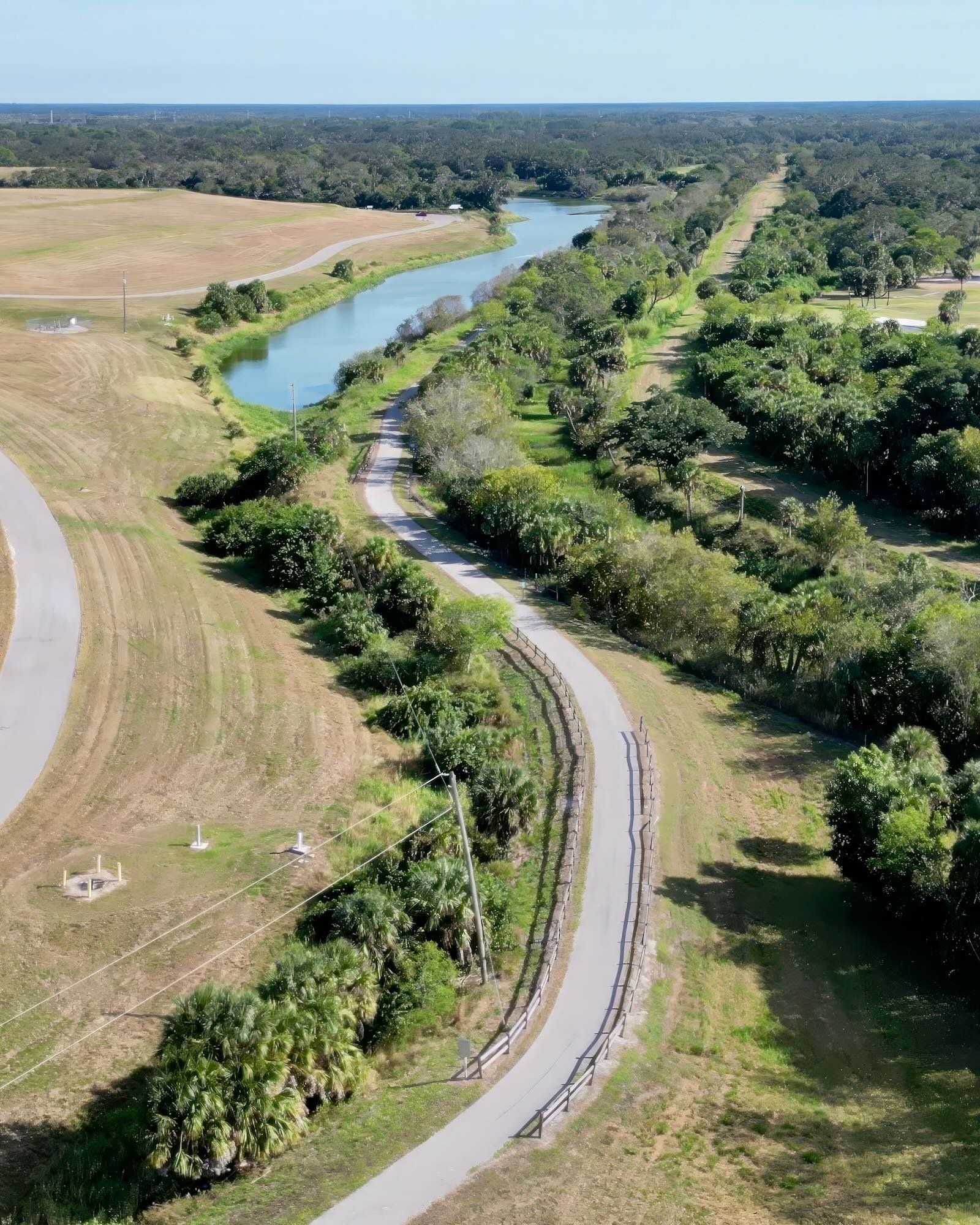 drone shot showing mound & paved trail at rothenbach park Sarasota